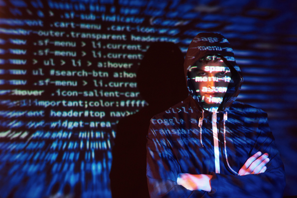 cyber-attack-with-unrecognizable-hooded-hacker-using-virtual-reality-digital-glitch-effect