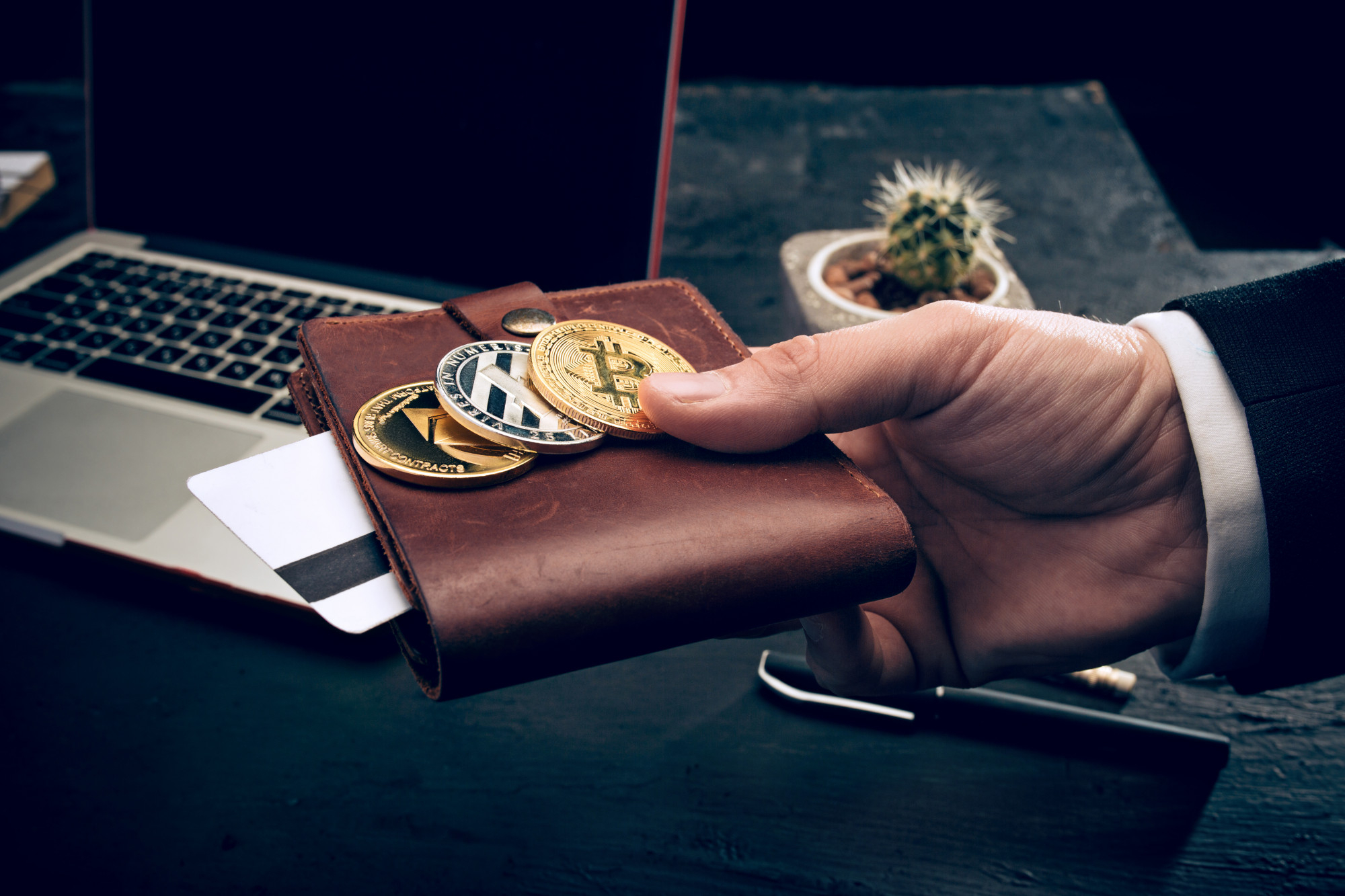 the-golden-bitcoin-in-mail-hands